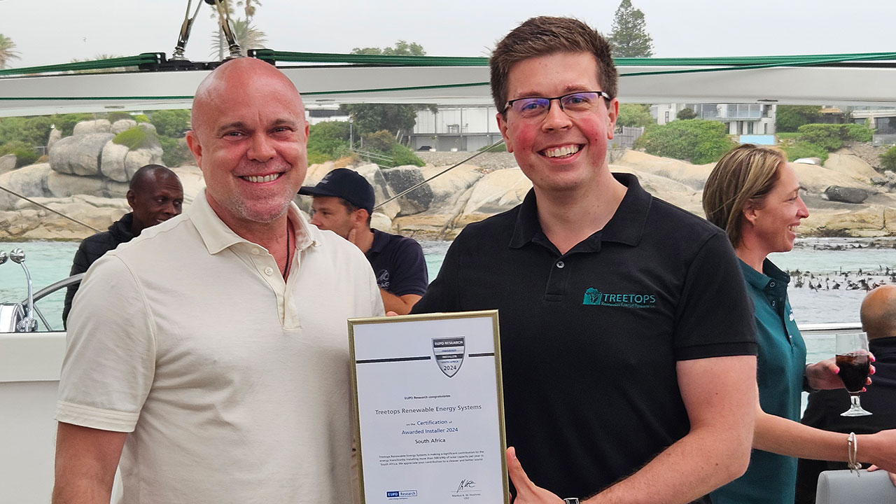 Stefan Ortmann accepting an award on behalf of Treetops