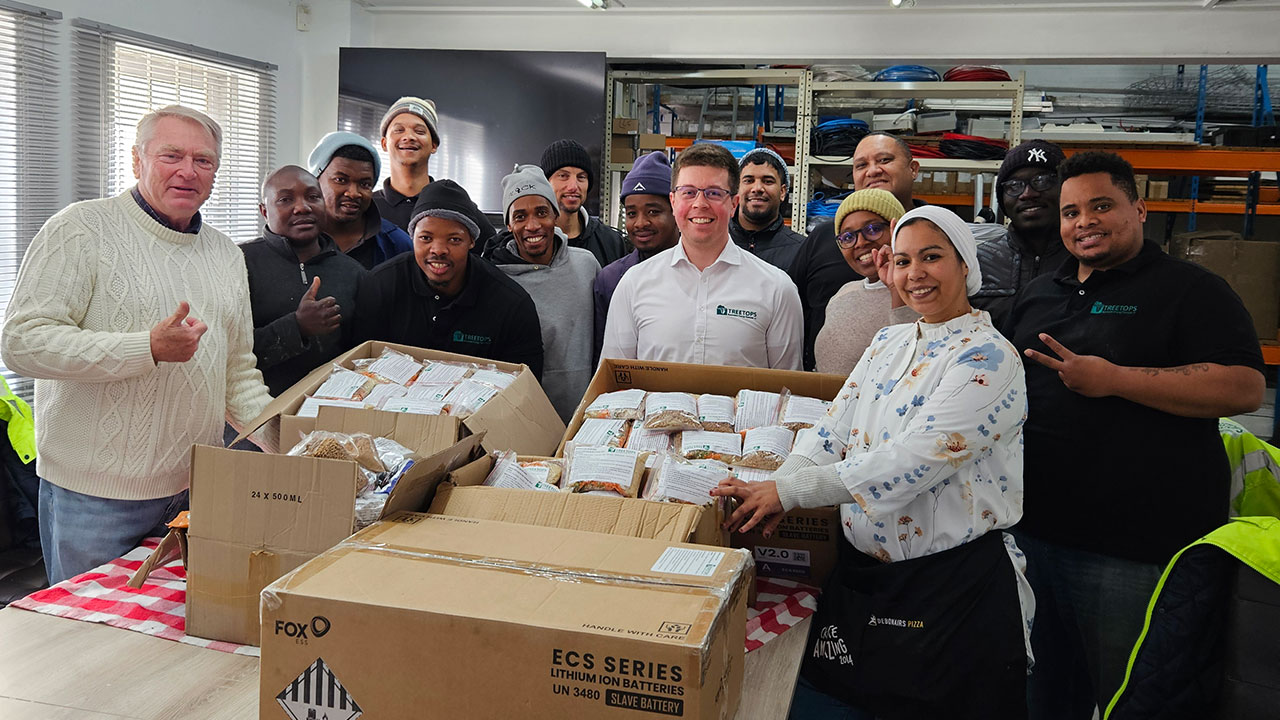 Treetops staff packing food parcels